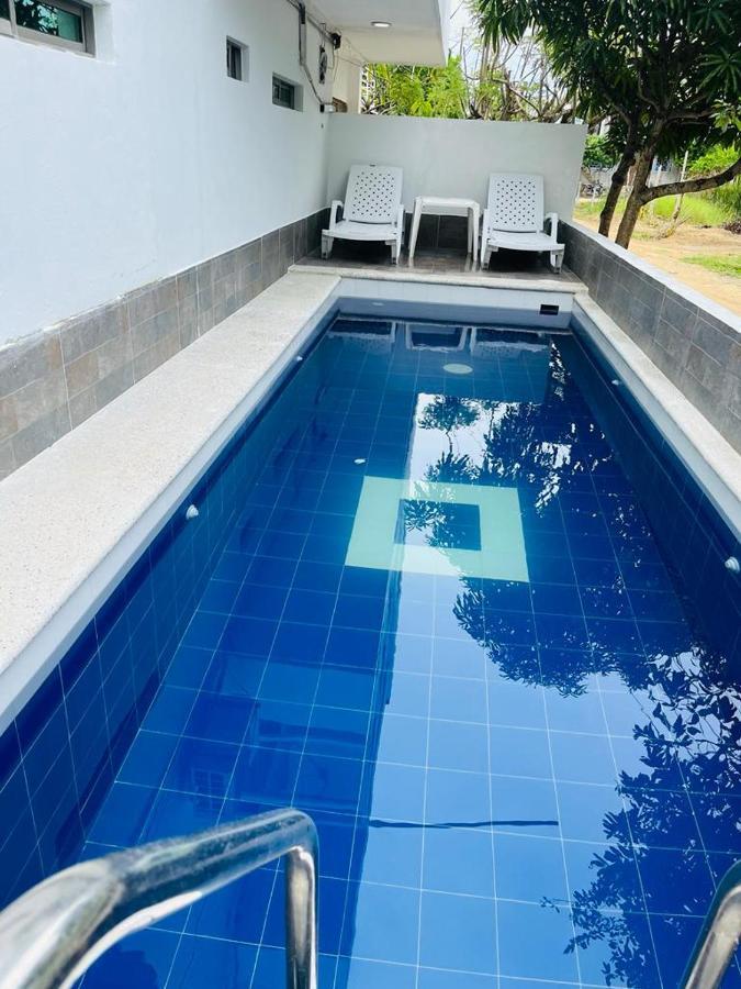 Apartahotel Eden Covenas Bagian luar foto